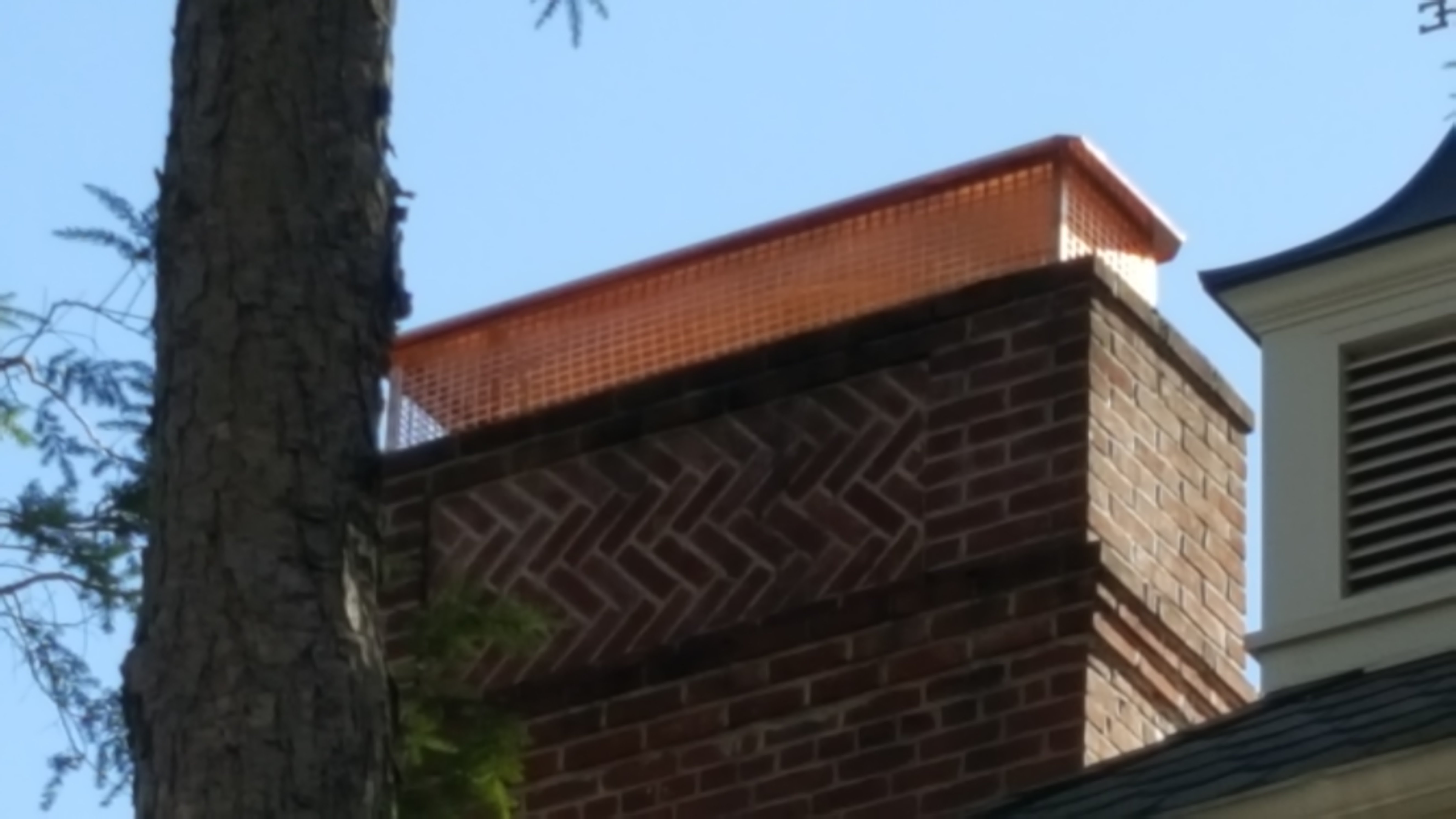 New stainless steel chimney cap installed in Westbury, NY