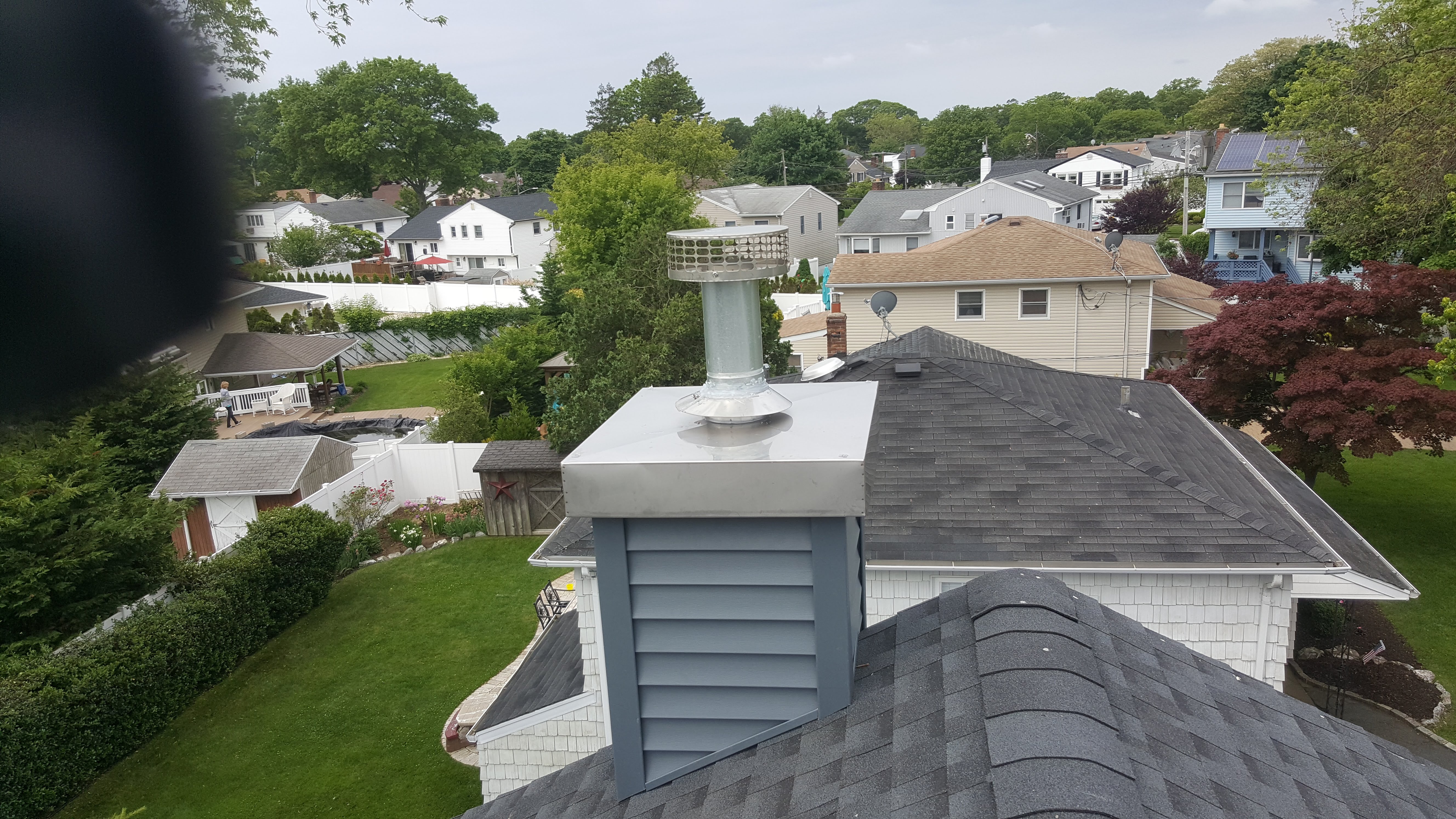 Complete chimney crown rebuild and waterproofing in Westbury, New York