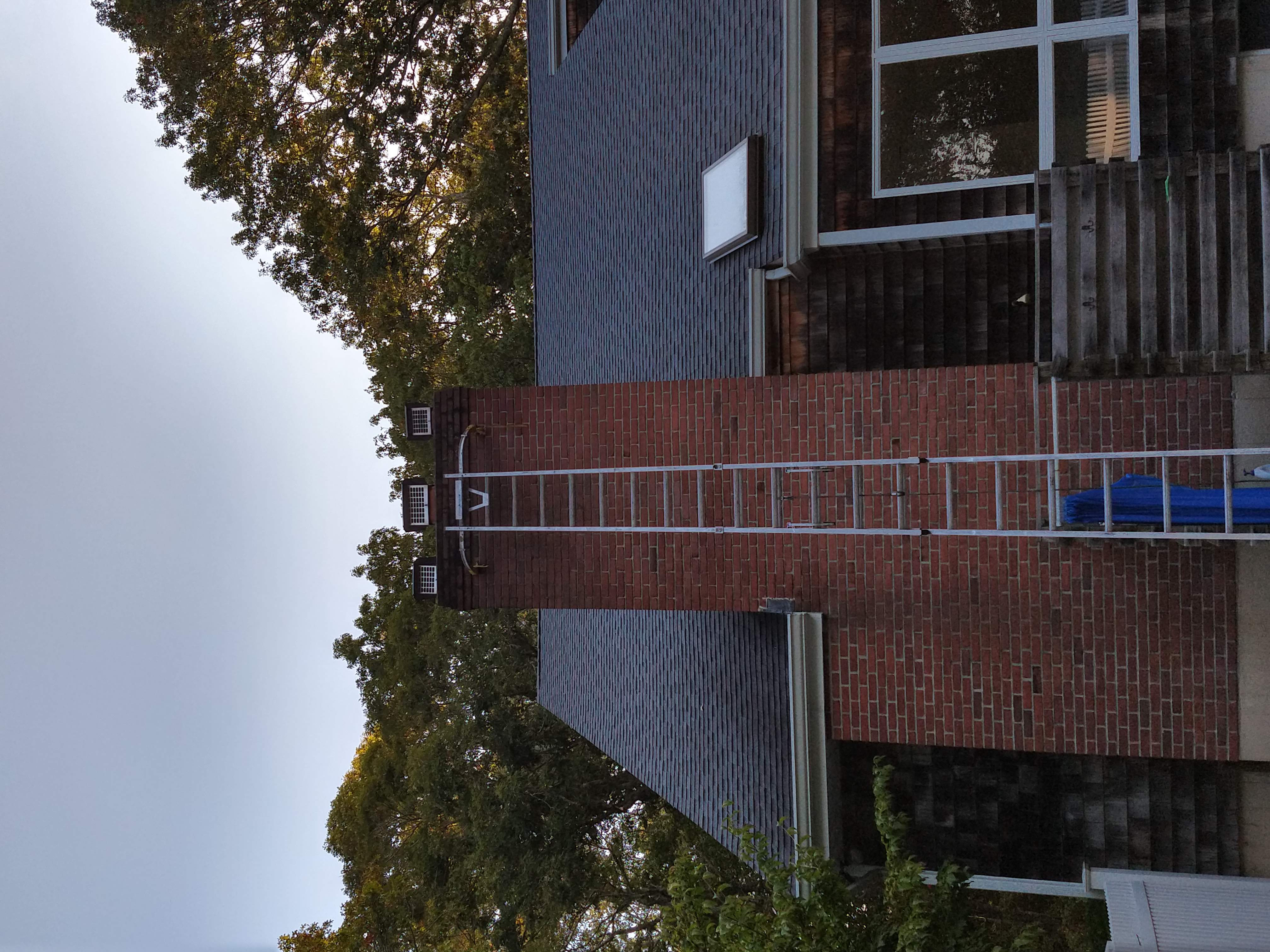 Draft-reducing chimney damper fixing heat loss in Westbury, NY